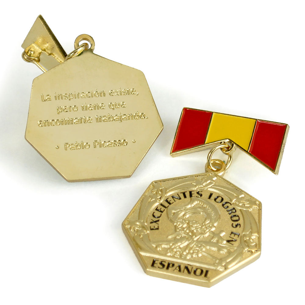 Gold Spanish honor medal with engraved Pablo Picasso quote on reverse and red and gold enamel Spanish flag design.